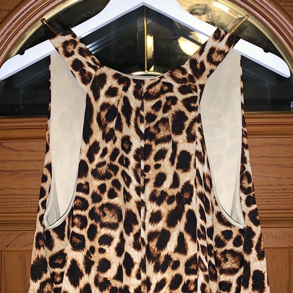 Everly Cheetah Leopard Print Flowy Peplum High Low V-Neck Sleeveless Blouse - Picture 12 of 16